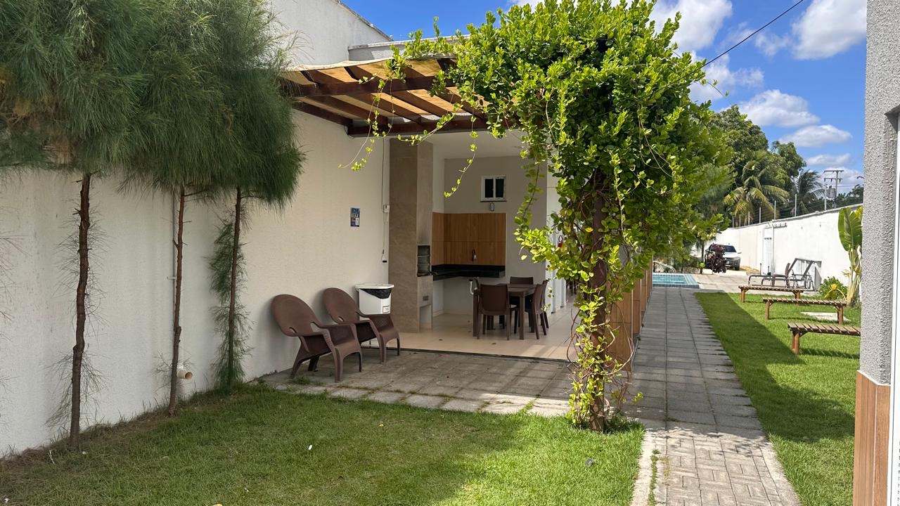 Área de lazer residencial com paisagismo